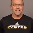 Person wearing glasses smiling