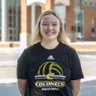 Person wearing Centre Colonels Volleyball tshirt and smiling at camera