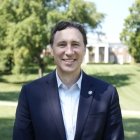 Person smiling at photographer