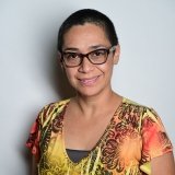 Person wearing glasses smiling