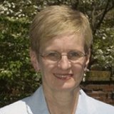 Person wearing glasses smiling