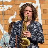 Person playing saxophone