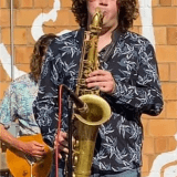 Person playing saxophone