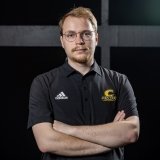 Person wearing glasses and smiling