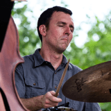 Person playing drum set