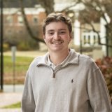 Person smiling at photographer