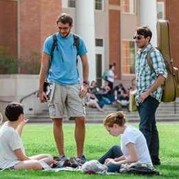 Students talking on campus between classes
