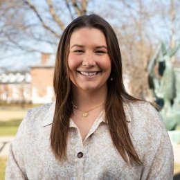 mckenna hulette - woman with brown hair wearing khaki sweater