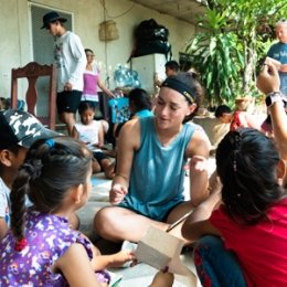 student working with kids in Merida, Mexico for study abroad
