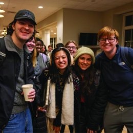 group of students waiting in line in cowan