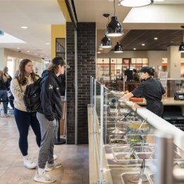 Students in line at flame cafe