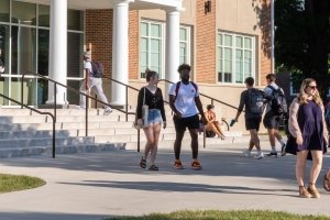 Students leave Franklin W. Olin Hall on the first day of class, 2022.