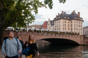 Students walking through Strasbourg historic buildings