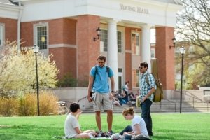 Group of students talking outside Young Hall