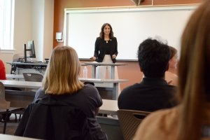 A student gives an oral presentation during the RICE Symposium.