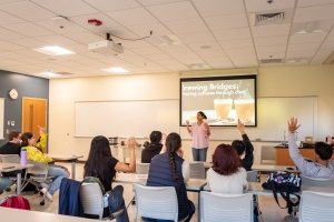 Mehak Mittal presents on chai during Building Bridges and Community Day