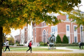 Students walking across campus