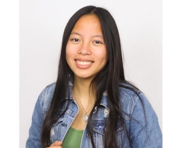 Person smiling at photographer