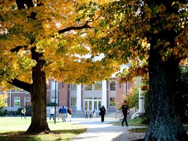 Centre student walking on campus in the fall