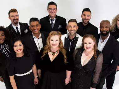 Voctave singers posing for a group portrait