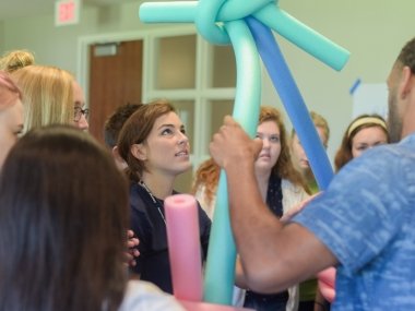 Students participating in team building activity