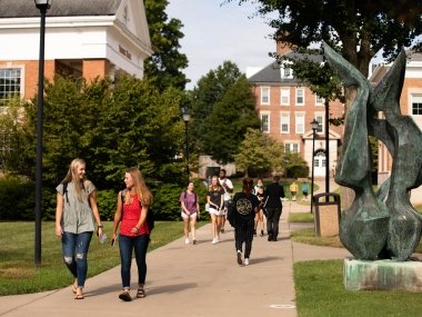 admissionevent001.jpg Students walking around campus between classes