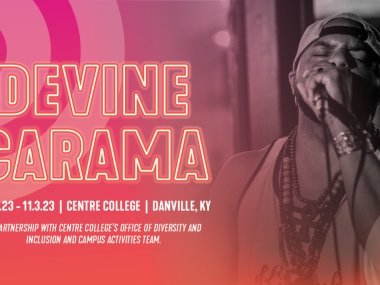 Devine Carama rapping into a microphone
