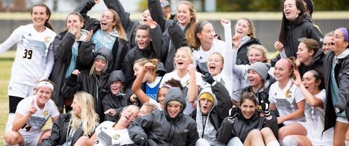 Centre women's soccer team celebrating a win