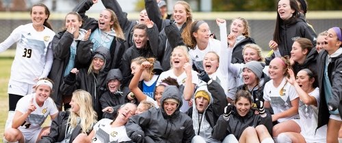 1900x798_athletics-soccer.jpg Centre women's soccer team celebrating a win