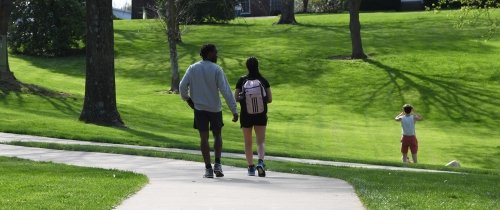 Two Centre students walking together on campus