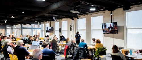 Students in Patten Mahler's economics of early childhood education class presented research for elected officials and community members at CentreWorks.