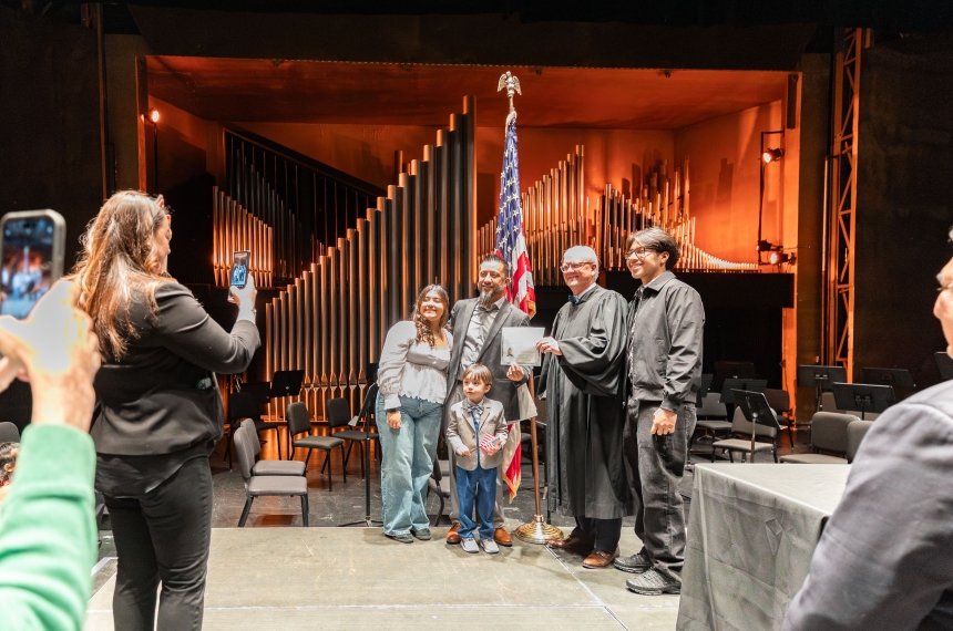 Centre hosts naturalization ceremony, welcoming 74 new U.S. citizens