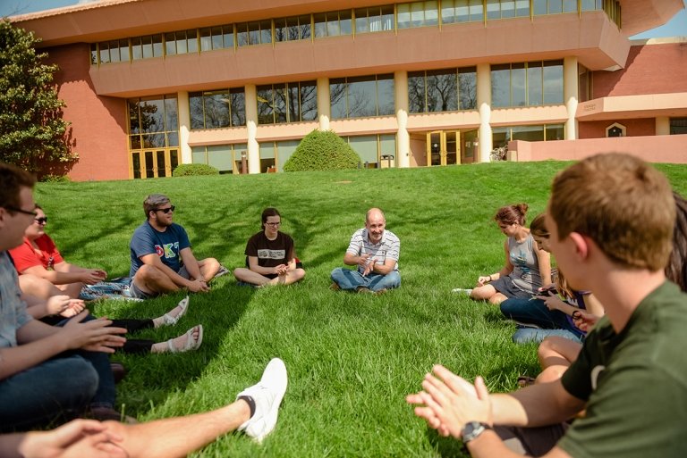 Music class meeting on the lawn of Grant Hall