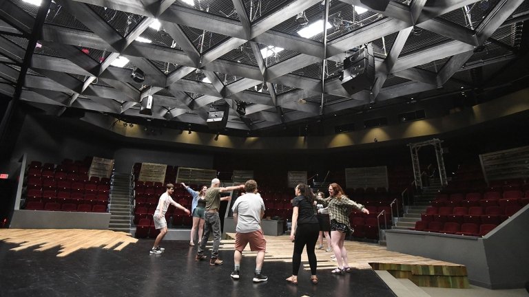 Centre student actors warming up before a performance