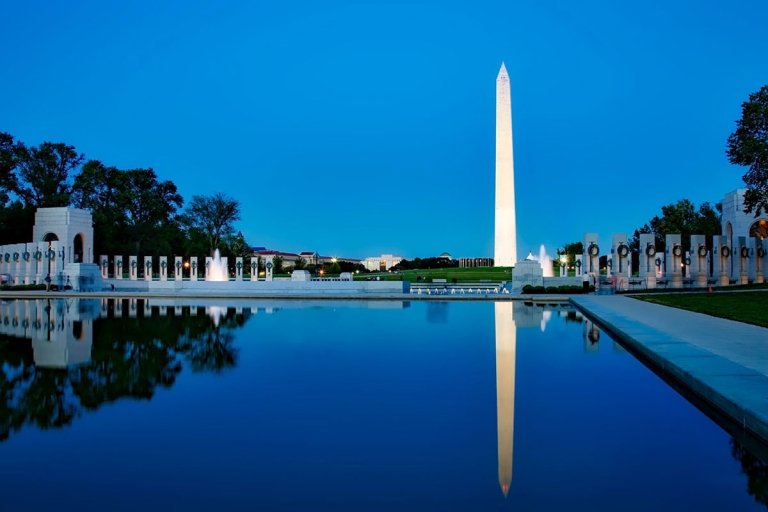 View of the Washington Monument and reflecting pool at dusk