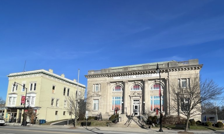 Two multi-story buildings sit side-by-side along Main Street in Danville, Kentucky. 