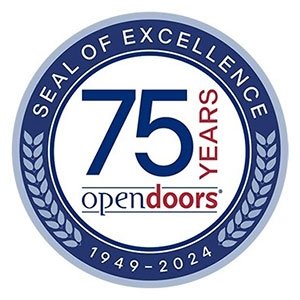 Circle with text Seal of Excellence 75 years open doors 1949-2024