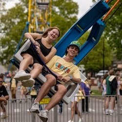 Students riding carnival ride