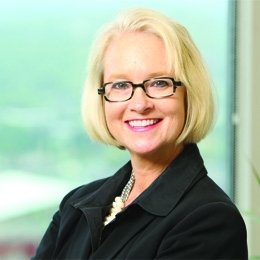 Person smiling at photographer