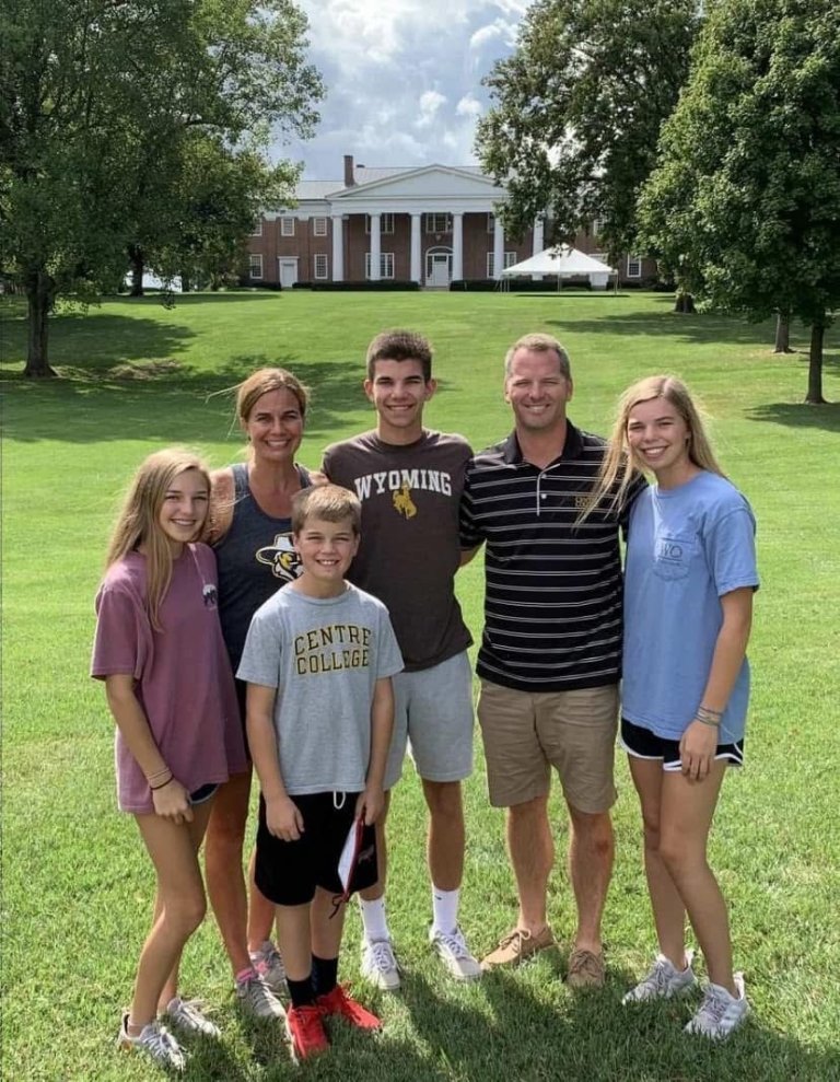 The Floyd family standing in front of old Centre.