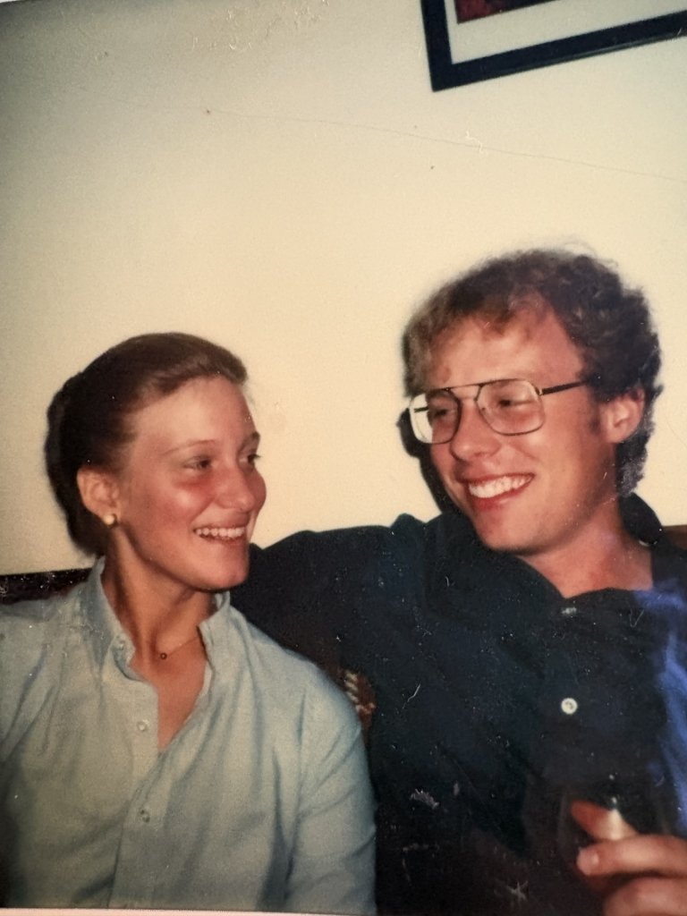 Young Ruth and Paul Burkey smiling.