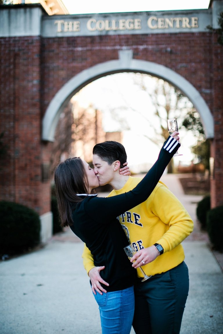 Liz and Olivia under the Centre Arch kissing after getting engaged.