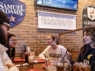 Group of students eating at a restaurant in Danville