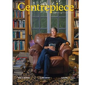 The cover a the Centrepiece alumni magazine shows Professor of English Stacy Peebles sitting in a leather armchair in the personal library of author Cormac McCarthy.