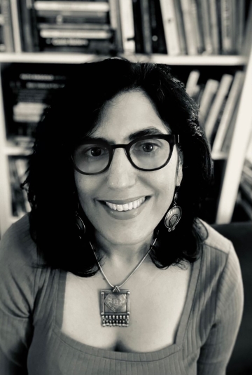 Person wearing glasses smiling