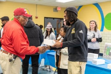 Students volunteered at the Danville community center, packing and handing out meals. 