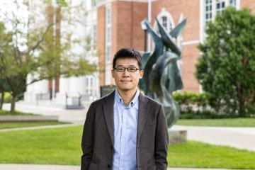 Person wearing glasses smiling