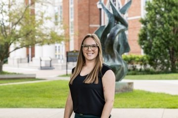Person wearing glasses smiling