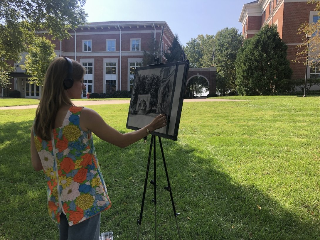 Anne Exterkamp, a German major with a minor in biology, draws on the Centre College campus.